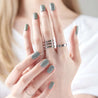 Slate colored semicured gel nails.