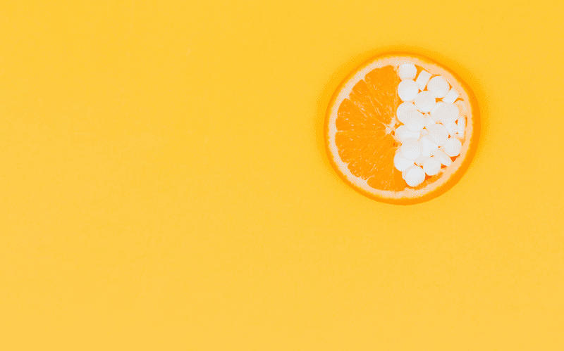 Vitamin C Tablets in an orange